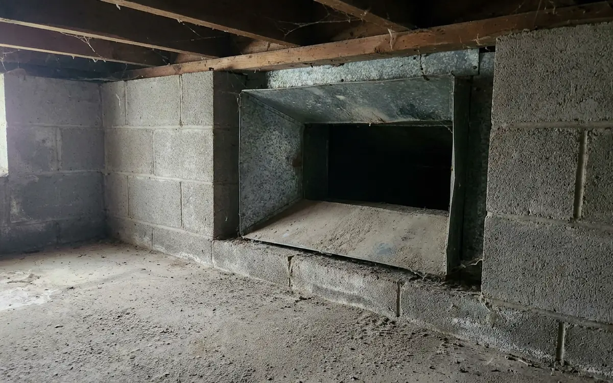 Return air duct opening being measured during a heating system evaluation